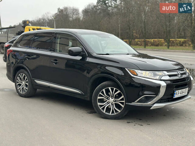 Чорний Міцубісі Аутлендер, об'ємом двигуна 2.36 л та пробігом 169 тис. км за 13450 $, фото 11 на Automoto.ua