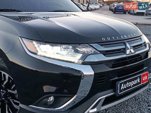 Чорний Міцубісі Аутлендер, об'ємом двигуна 2 л та пробігом 115 тис. км за 23700 $, фото 13 на Automoto.ua