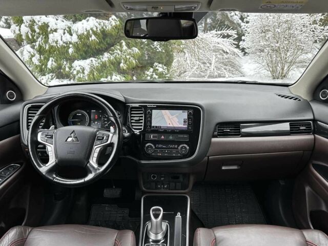 Черный Мицубиси Аутлендер, объемом двигателя 2 л и пробегом 65 тыс. км за 13200 $, фото 7 на Automoto.ua