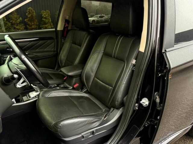 Чорний Міцубісі Аутлендер, об'ємом двигуна 2 л та пробігом 79 тис. км за 22900 $, фото 14 на Automoto.ua