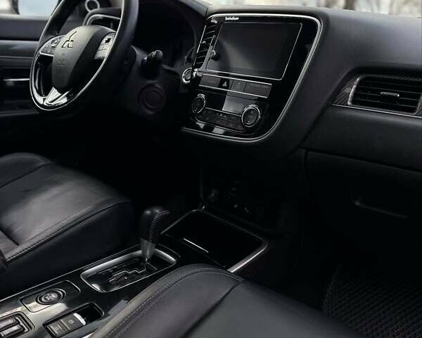 Черный Мицубиси Аутлендер, объемом двигателя 2.36 л и пробегом 91 тыс. км за 18300 $, фото 19 на Automoto.ua