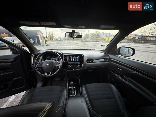 Черный Мицубиси Аутлендер, объемом двигателя 2.36 л и пробегом 153 тыс. км за 14800 $, фото 5 на Automoto.ua