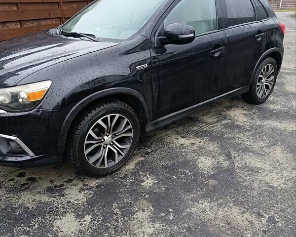 Чорний Міцубісі Аутлендер, об'ємом двигуна 2 л та пробігом 148 тис. км за 13000 $, фото 1 на Automoto.ua