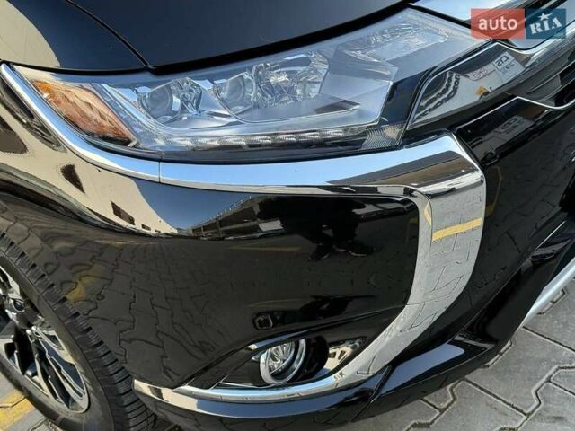 Черный Мицубиси Аутлендер, объемом двигателя 2 л и пробегом 67 тыс. км за 23000 $, фото 7 на Automoto.ua