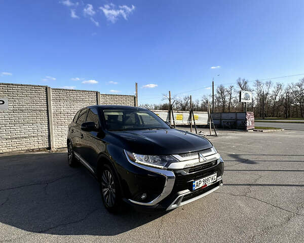 Чорний Міцубісі Аутлендер, об'ємом двигуна 2.36 л та пробігом 126 тис. км за 17500 $, фото 2 на Automoto.ua