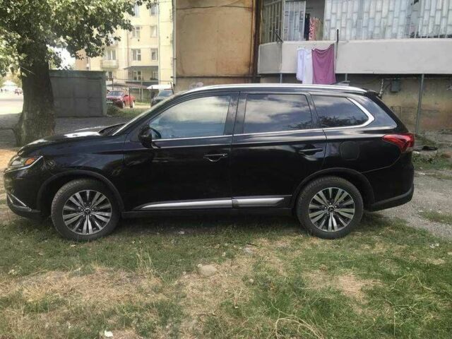 Черный Мицубиси Аутлендер, объемом двигателя 2.4 л и пробегом 125 тыс. км за 11200 $, фото 6 на Automoto.ua