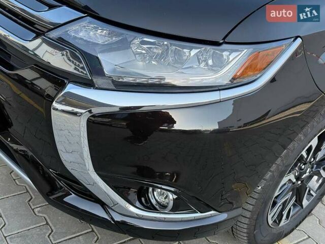 Черный Мицубиси Аутлендер, объемом двигателя 2 л и пробегом 67 тыс. км за 23000 $, фото 8 на Automoto.ua