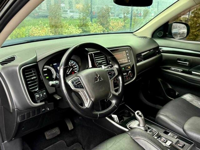 Чорний Міцубісі Аутлендер, об'ємом двигуна 2 л та пробігом 79 тис. км за 22900 $, фото 11 на Automoto.ua