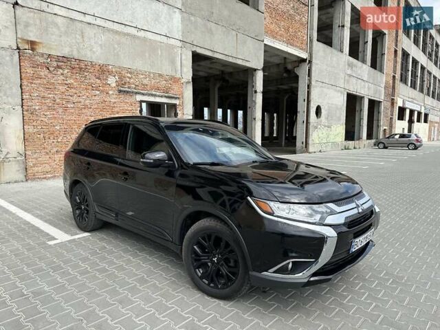 Чорний Міцубісі Аутлендер, об'ємом двигуна 2.4 л та пробігом 81 тис. км за 17100 $, фото 2 на Automoto.ua