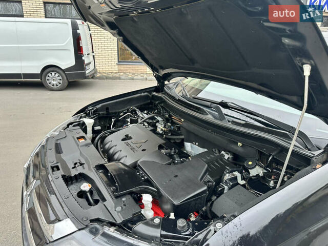 Чорний Міцубісі Аутлендер, об'ємом двигуна 2.36 л та пробігом 169 тис. км за 13450 $, фото 33 на Automoto.ua