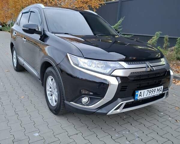 Міцубісі Аутлендер 2018 у Белой Церкве на Automoto.ua Чорний Міцубісі Аутлендер, об'ємом двигуна 2 л та пробігом 121 тис. км за 17800 $, фото 1 на Automoto.ua