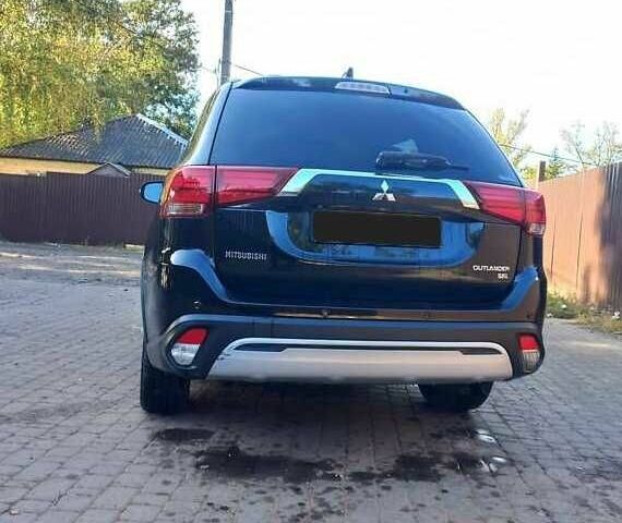 Черный Мицубиси Аутлендер, объемом двигателя 2.4 л и пробегом 132 тыс. км за 17600 $, фото 8 на Automoto.ua