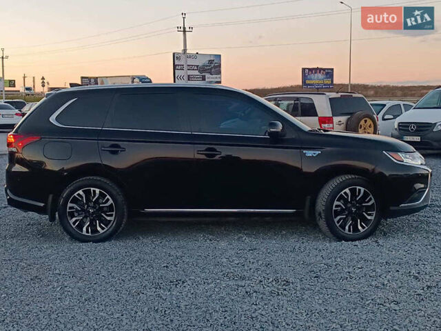 Чорний Міцубісі Аутлендер, об'ємом двигуна 2 л та пробігом 115 тис. км за 23700 $, фото 10 на Automoto.ua