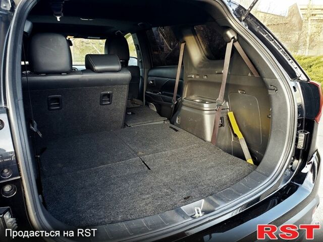 Черный Мицубиси Аутлендер, объемом двигателя 2.4 л и пробегом 130 тыс. км за 16499 $, фото 11 на Automoto.ua