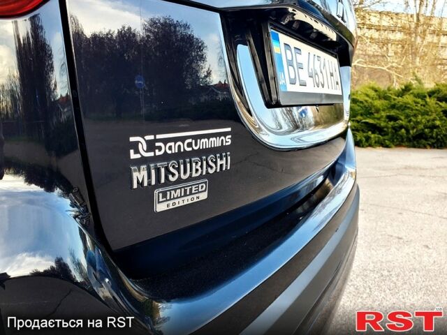 Черный Мицубиси Аутлендер, объемом двигателя 2.4 л и пробегом 130 тыс. км за 16499 $, фото 4 на Automoto.ua