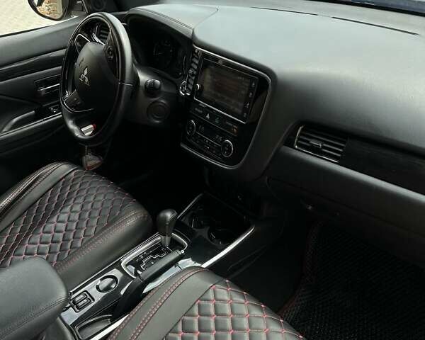 Чорний Міцубісі Аутлендер, об'ємом двигуна 2.4 л та пробігом 81 тис. км за 17100 $, фото 16 на Automoto.ua