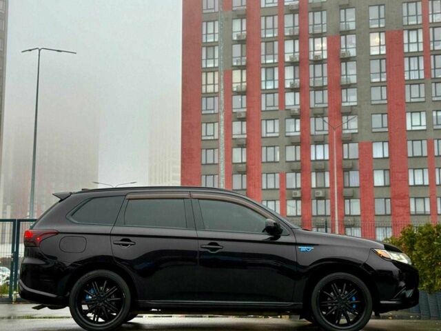 Чорний Міцубісі Аутлендер, об'ємом двигуна 2 л та пробігом 79 тис. км за 22900 $, фото 7 на Automoto.ua