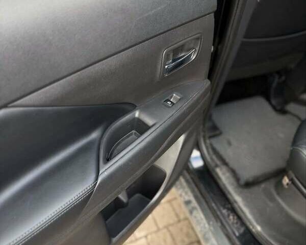 Черный Мицубиси Аутлендер, объемом двигателя 2.36 л и пробегом 91 тыс. км за 18300 $, фото 8 на Automoto.ua