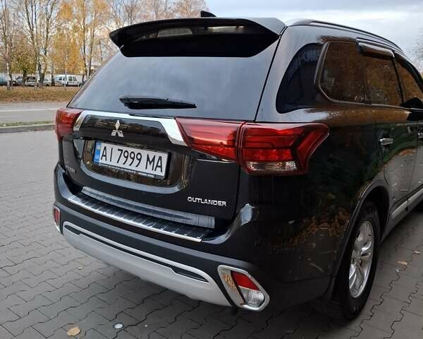 Міцубісі Аутлендер 2018 у Белой Церкве на Automoto.ua Чорний Міцубісі Аутлендер, об'ємом двигуна 2 л та пробігом 121 тис. км за 17800 $, фото 3 на Automoto.ua
