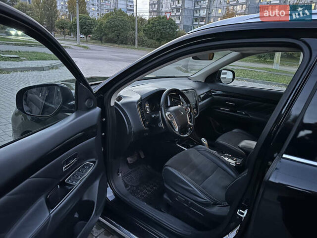 Мицубиси Аутлендер 2018 в Черкассах на Automoto.ua Черный Мицубиси Аутлендер, объемом двигателя 2 л и пробегом 147 тыс. км за 20000 $, фото 8 на Automoto.ua