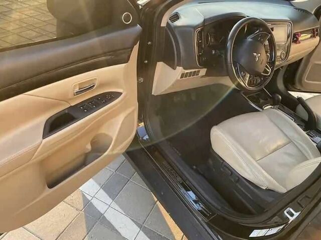 Черный Мицубиси Аутлендер, объемом двигателя 2.4 л и пробегом 75 тыс. км за 13000 $, фото 8 на Automoto.ua