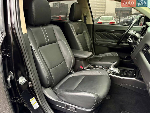 Чорний Міцубісі Аутлендер, об'ємом двигуна 2 л та пробігом 79 тис. км за 22900 $, фото 41 на Automoto.ua