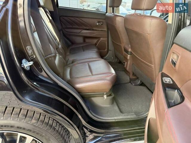 Черный Мицубиси Аутлендер, объемом двигателя 2 л и пробегом 67 тыс. км за 23000 $, фото 30 на Automoto.ua