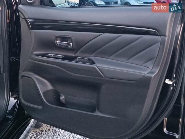 Чорний Міцубісі Аутлендер, об'ємом двигуна 2 л та пробігом 115 тис. км за 23700 $, фото 31 на Automoto.ua