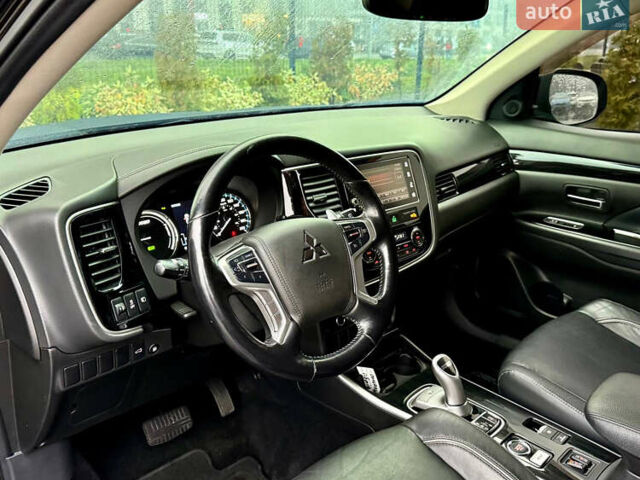 Чорний Міцубісі Аутлендер, об'ємом двигуна 2 л та пробігом 79 тис. км за 22900 $, фото 20 на Automoto.ua