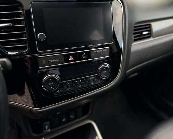 Черный Мицубиси Аутлендер, объемом двигателя 2.36 л и пробегом 91 тыс. км за 18300 $, фото 16 на Automoto.ua