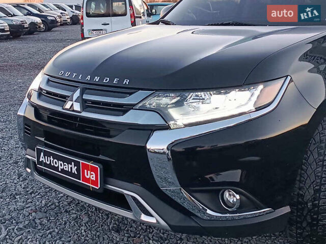 Чорний Міцубісі Аутлендер, об'ємом двигуна 2 л та пробігом 115 тис. км за 23700 $, фото 16 на Automoto.ua
