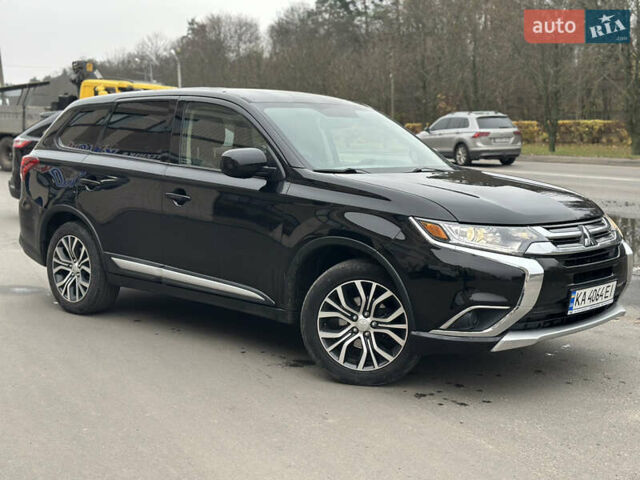 Чорний Міцубісі Аутлендер, об'ємом двигуна 2.36 л та пробігом 169 тис. км за 13450 $, фото 2 на Automoto.ua