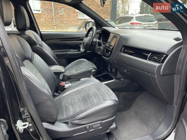 Чорний Міцубісі Аутлендер, об'ємом двигуна 2.36 л та пробігом 153 тис. км за 16450 $, фото 8 на Automoto.ua
