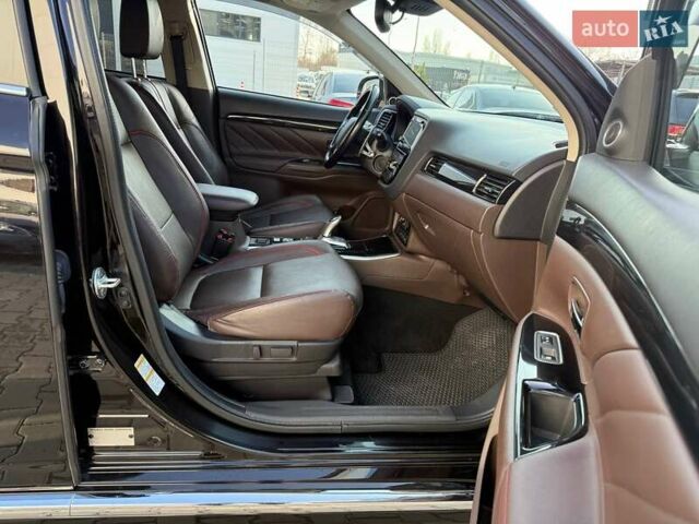 Черный Мицубиси Аутлендер, объемом двигателя 2 л и пробегом 67 тыс. км за 23000 $, фото 32 на Automoto.ua