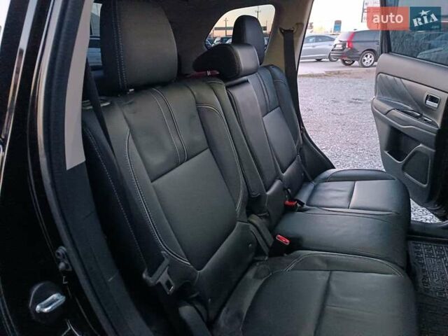 Чорний Міцубісі Аутлендер, об'ємом двигуна 2 л та пробігом 115 тис. км за 23700 $, фото 35 на Automoto.ua
