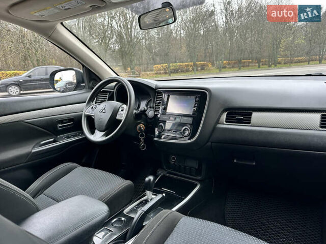 Чорний Міцубісі Аутлендер, об'ємом двигуна 2.36 л та пробігом 169 тис. км за 13450 $, фото 23 на Automoto.ua
