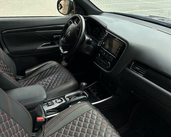 Чорний Міцубісі Аутлендер, об'ємом двигуна 2.4 л та пробігом 81 тис. км за 17100 $, фото 15 на Automoto.ua