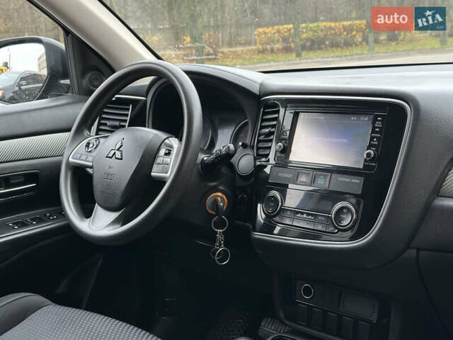 Чорний Міцубісі Аутлендер, об'ємом двигуна 2.36 л та пробігом 169 тис. км за 13450 $, фото 24 на Automoto.ua