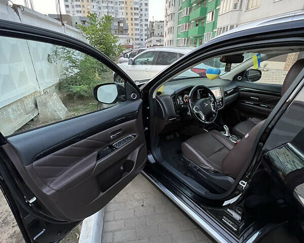 Чорний Міцубісі Аутлендер, об'ємом двигуна 2 л та пробігом 155 тис. км за 22500 $, фото 7 на Automoto.ua