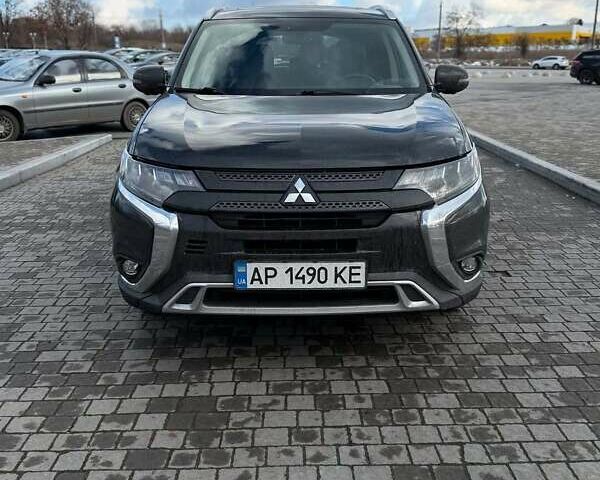 Черный Мицубиси Аутлендер, объемом двигателя 2.36 л и пробегом 91 тыс. км за 18300 $, фото 1 на Automoto.ua