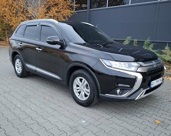 Міцубісі Аутлендер 2018 у Белой Церкве на Automoto.ua Чорний Міцубісі Аутлендер, об'ємом двигуна 2 л та пробігом 121 тис. км за 17800 $, фото 5 на Automoto.ua