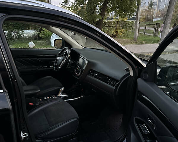 Мицубиси Аутлендер 2018 в Черкассах на Automoto.ua Черный Мицубиси Аутлендер, объемом двигателя 2 л и пробегом 147 тыс. км за 20000 $, фото 6 на Automoto.ua