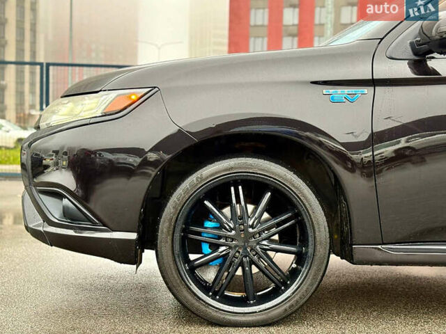 Чорний Міцубісі Аутлендер, об'ємом двигуна 2 л та пробігом 79 тис. км за 22900 $, фото 9 на Automoto.ua