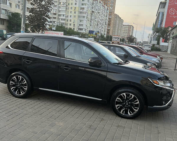 Чорний Міцубісі Аутлендер, об'ємом двигуна 2 л та пробігом 155 тис. км за 22500 $, фото 4 на Automoto.ua