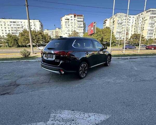 Черный Мицубиси Аутлендер, объемом двигателя 2 л и пробегом 71 тыс. км за 19800 $, фото 10 на Automoto.ua