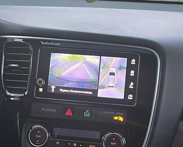 Чорний Міцубісі Аутлендер, об'ємом двигуна 2 л та пробігом 155 тис. км за 22500 $, фото 25 на Automoto.ua