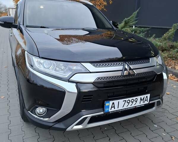 Міцубісі Аутлендер 2018 у Белой Церкве на Automoto.ua Чорний Міцубісі Аутлендер, об'ємом двигуна 2 л та пробігом 121 тис. км за 17800 $, фото 9 на Automoto.ua