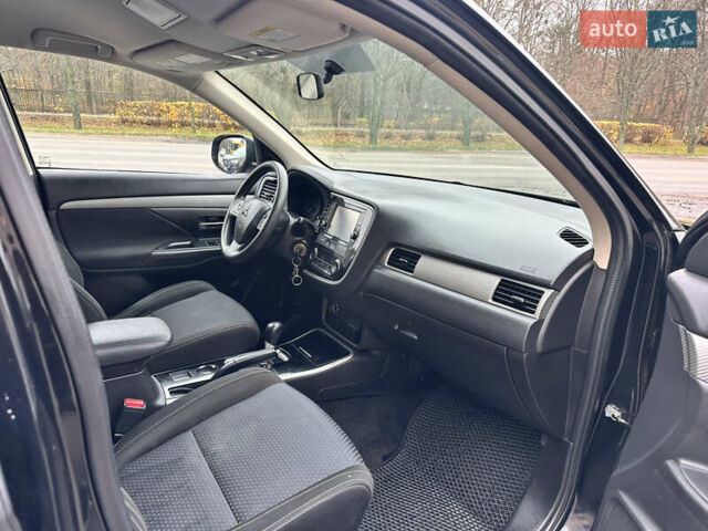 Чорний Міцубісі Аутлендер, об'ємом двигуна 2.36 л та пробігом 169 тис. км за 13450 $, фото 19 на Automoto.ua