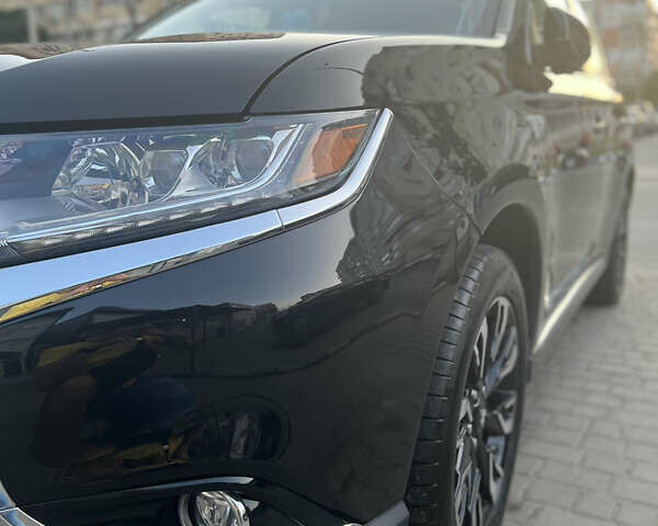 Чорний Міцубісі Аутлендер, об'ємом двигуна 2 л та пробігом 155 тис. км за 22500 $, фото 20 на Automoto.ua