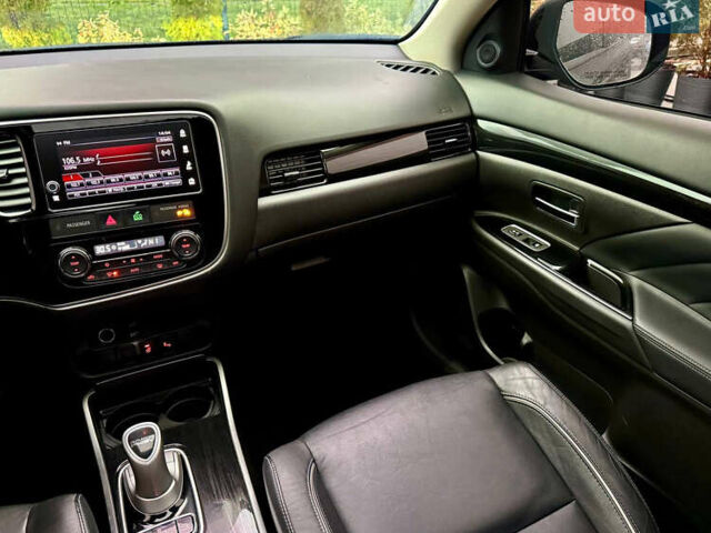 Чорний Міцубісі Аутлендер, об'ємом двигуна 2 л та пробігом 79 тис. км за 22900 $, фото 35 на Automoto.ua